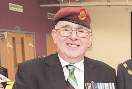 Military police group ousts member over disputed service claim